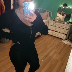 A dark green sweater